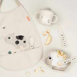 Bavoir élastique avec poche Tiny Farm sable