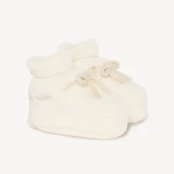 Chaussons en tricot avec nœuds décoratifs pour bébé