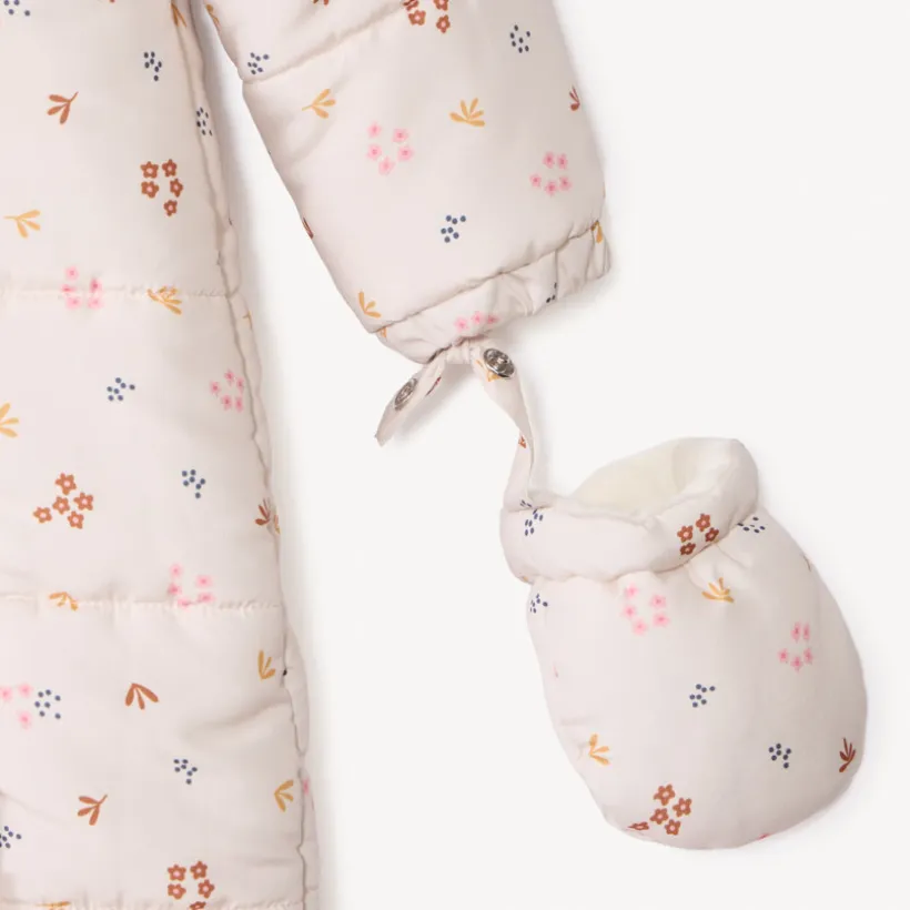 Combi-pilote imprimé fleurs pour bébé fille avec finitions différentes selon l'âge