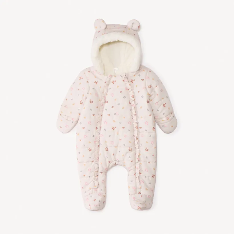 Combi-pilote imprimé fleurs pour bébé fille avec finitions différentes selon l'âge