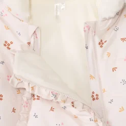 Combi-pilote imprimé fleurs pour bébé fille avec finitions différentes selon l'âge