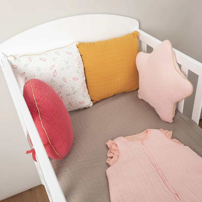 Coussin décoratif rond en tétra modulable en tour de lit ou de parc