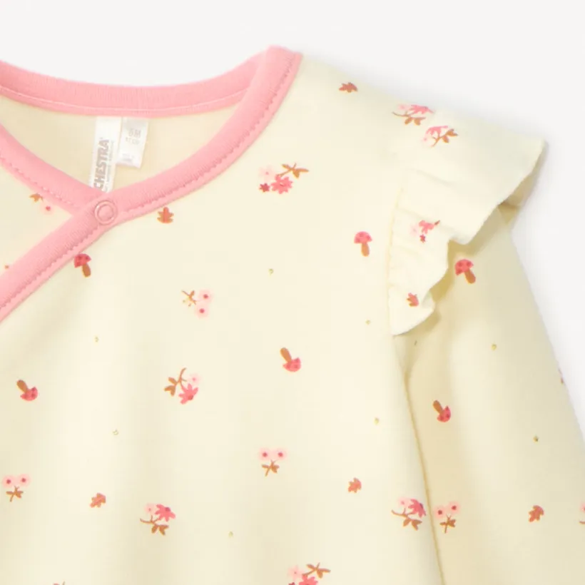 Dors-bien imprimé fleurs pour bébé fille avec ouvertures différentes selon l'âge
