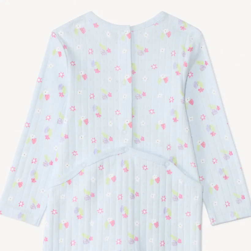 Ensemble dors-bien + bavoir à fleurs pour bébé fille avec ouvertures différentes selon l'âge