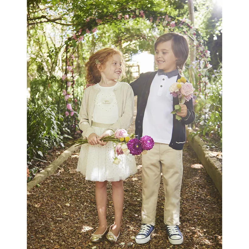 Gilet court en tricot avec base festonnée pour fille