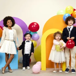 Gilet en tricot ajouré avec jeu de mailles torsadées pour fille