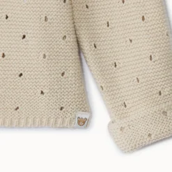 Gilet en tricot point mousse ajouré pour bébé