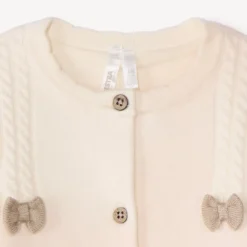 Gilet en tricot à torsades et nœuds pour bébé fille