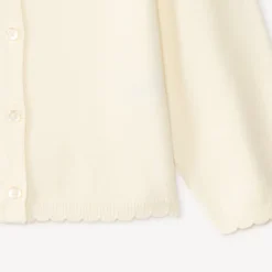 Gilet en tricot uni festonné pour bébé fille