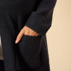 Gilet long uni en tricot avec poches pour femme