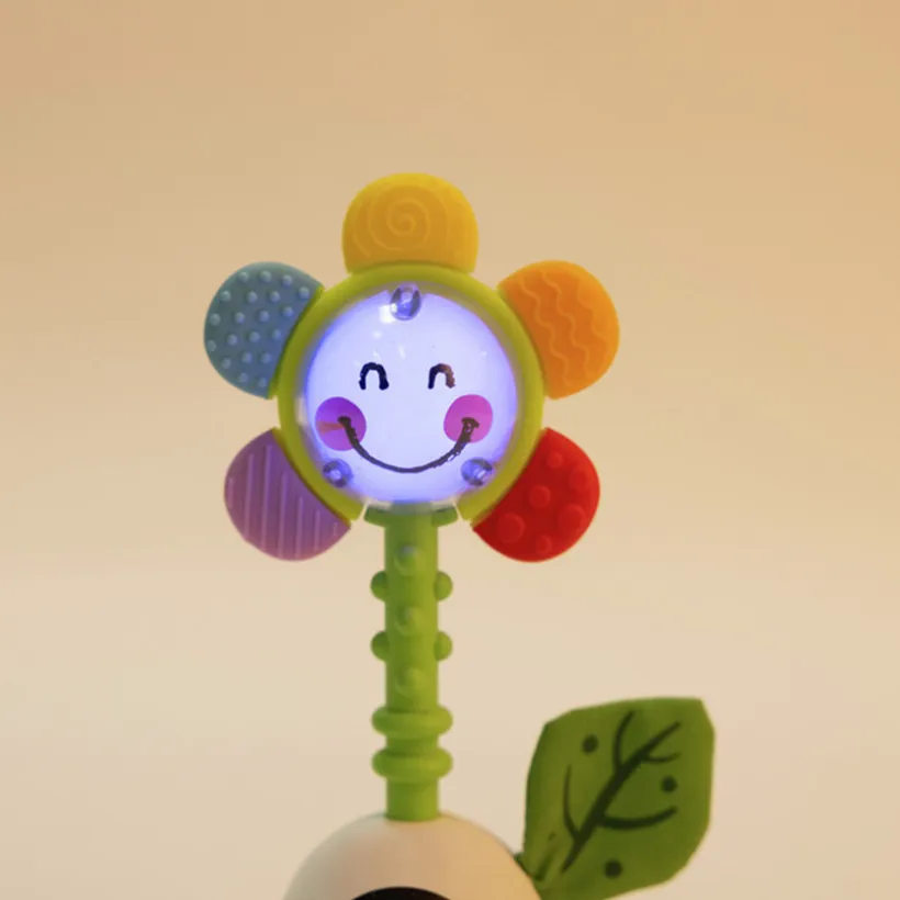 Hochet fleur lumineux et musical