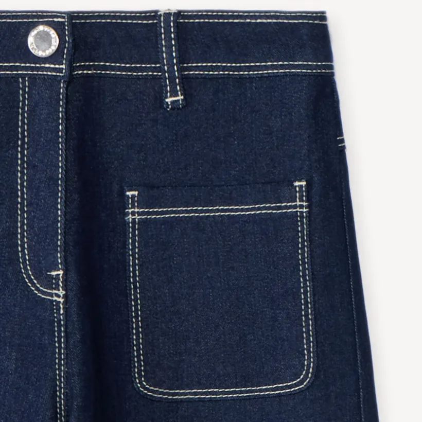 Jean fille coupe large uni avec poches plaquées