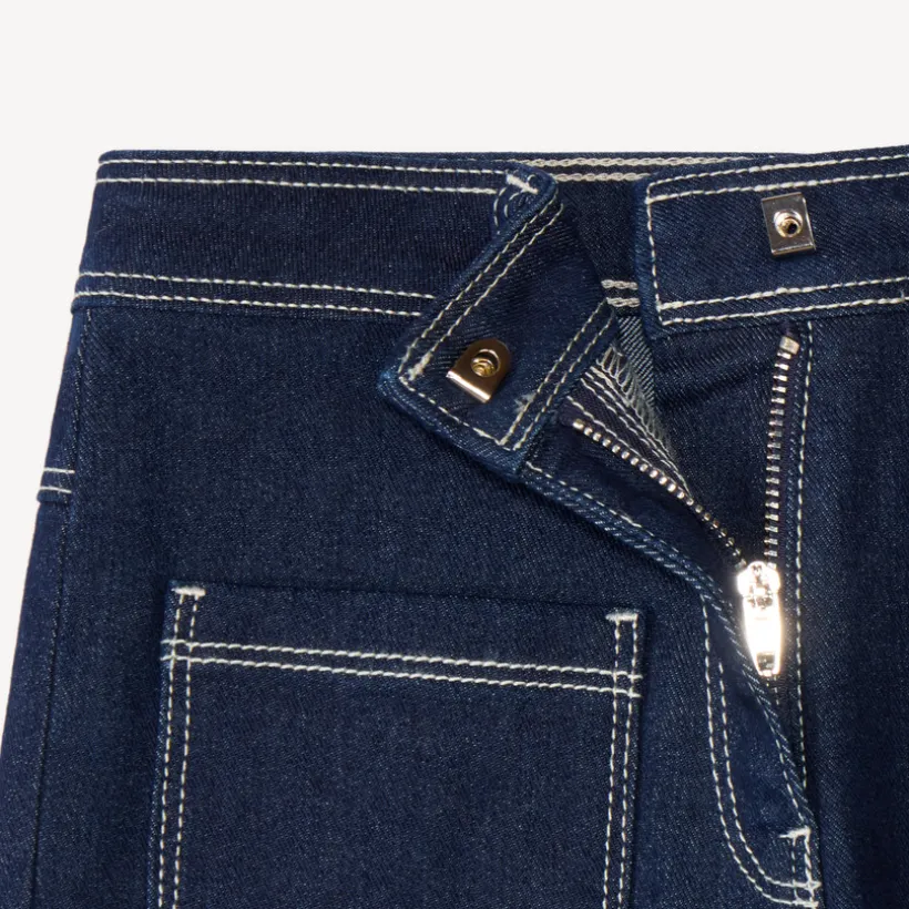 Jean fille coupe large uni avec poches plaquées