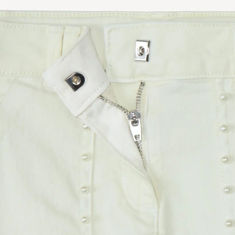 Jean large à poches avec perles nacrées pour fille