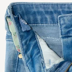 Jean slim fille avec ceinture en tissu