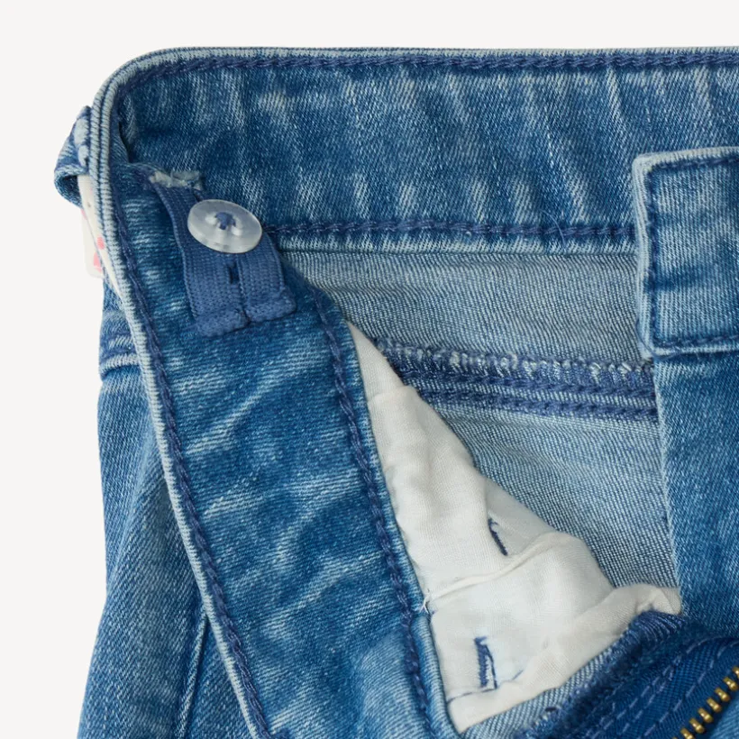 Jean slim fille avec ceinture en tissu