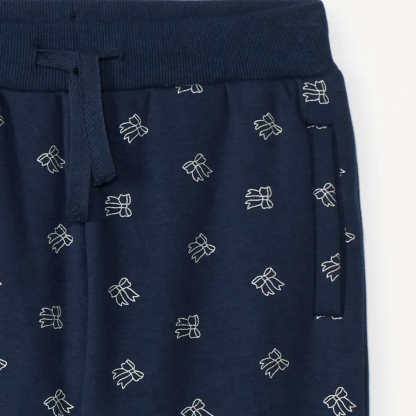 Jogging molleton imprimé nœuds et doublé pour fille