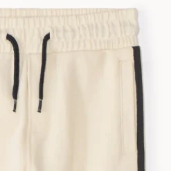 Jogging molleton uni à bandes pour garçon