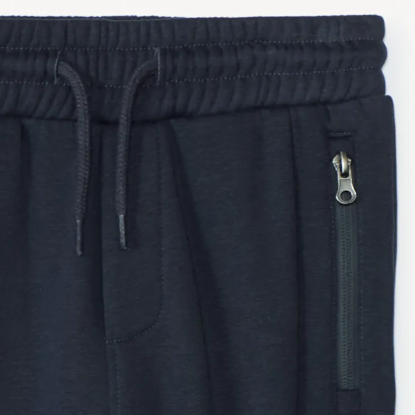 Jogging molleton uni à poches zippées pour garçon