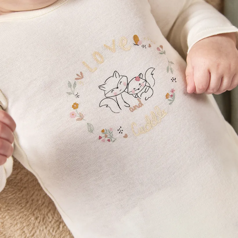 Lot de 7 bodies fantaisie en maille côte pour bébé fille