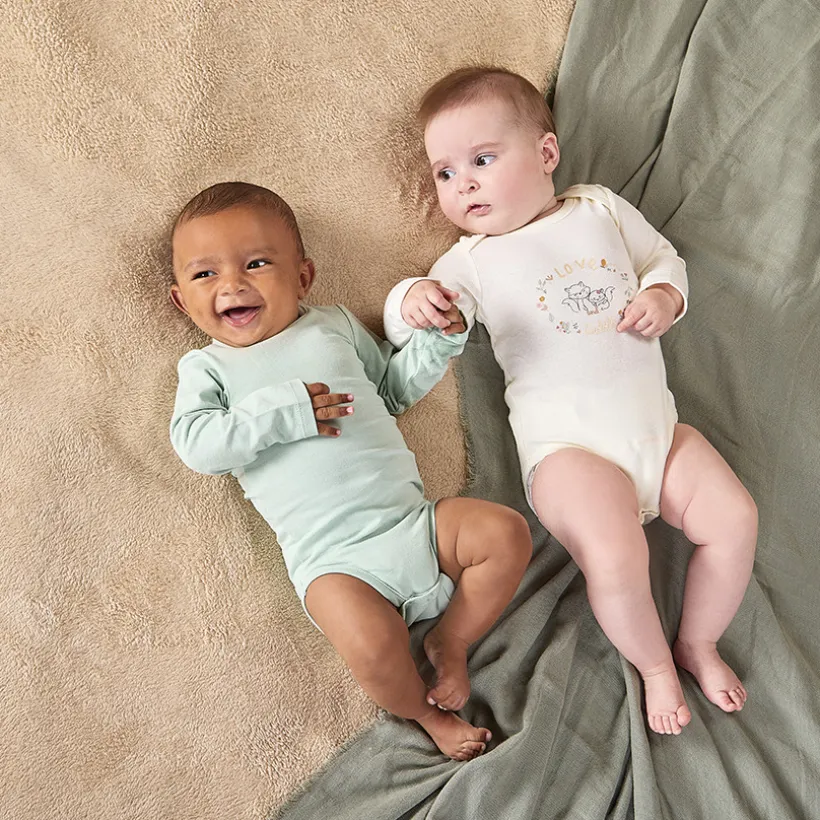 Lot de 7 bodies fantaisie en maille côte pour bébé fille