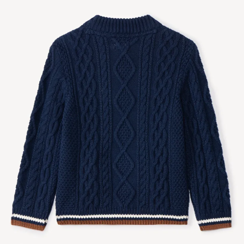 Pull en tricot uni effet torsadé avec liseré coloré pour garçon