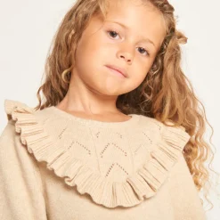 Robe en tricot uni et ajouré avec volants pour fille