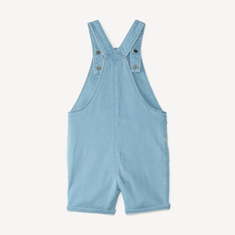 Salopette courte en jean style workwear avec broderie palmier pour bébé garçon